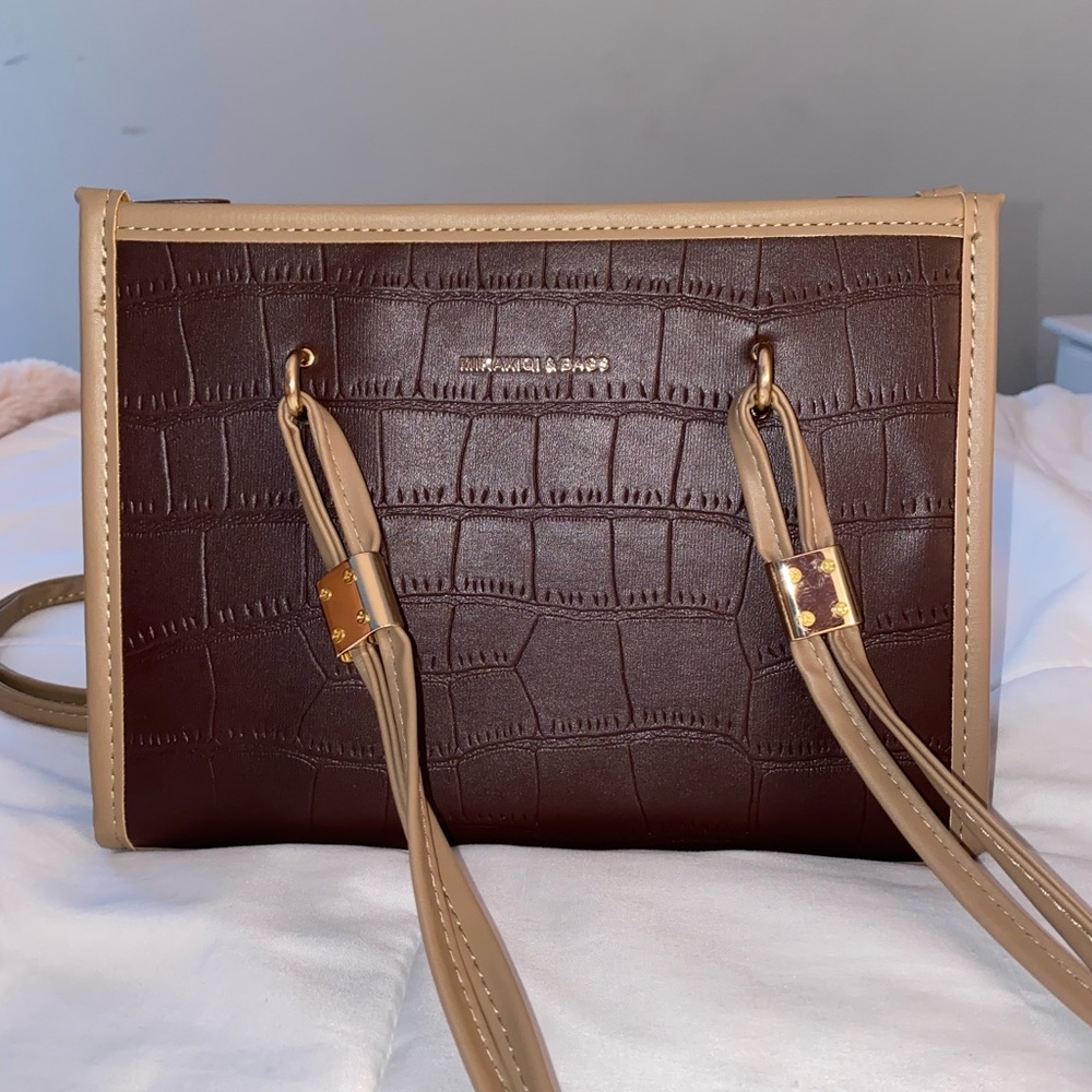 brown & tan leather purse